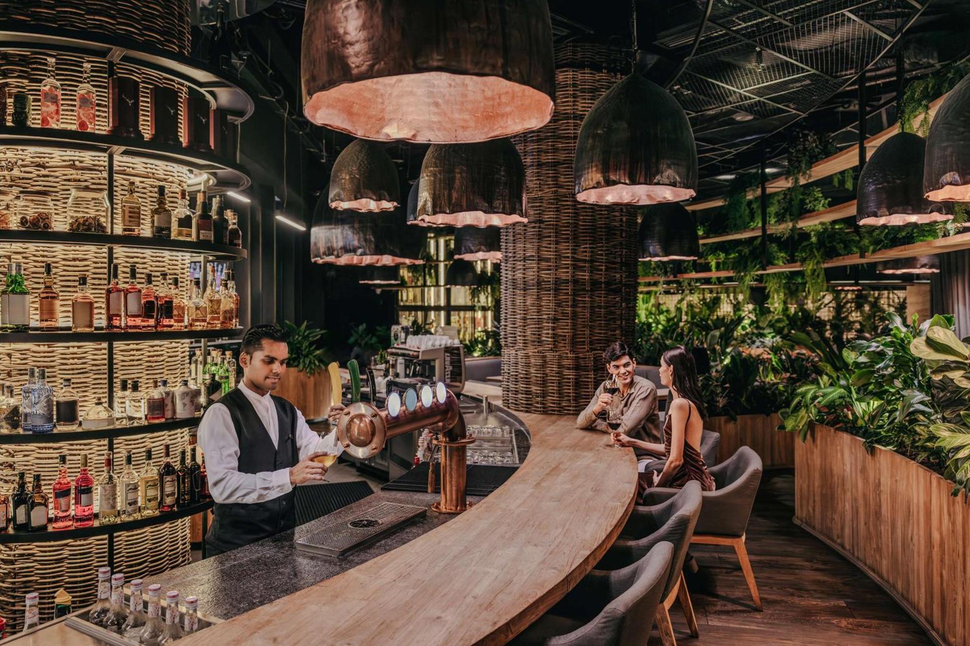 ดุสิตธานี ลากูนา สิงคโปร์ Hotel ภายนอก รูปภาพ The interior of a typical Starbucks Reserve store